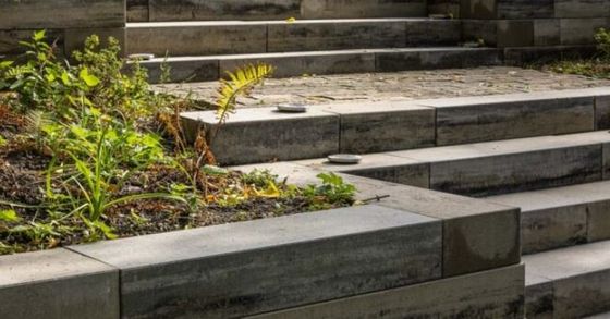Natural stone retaining wall with stairs build by kamloops retaining wall