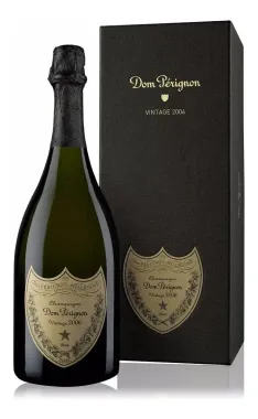 Botella de champán Dom Pérignon con caja de regalo negra, ambas con etiquetas doradas.