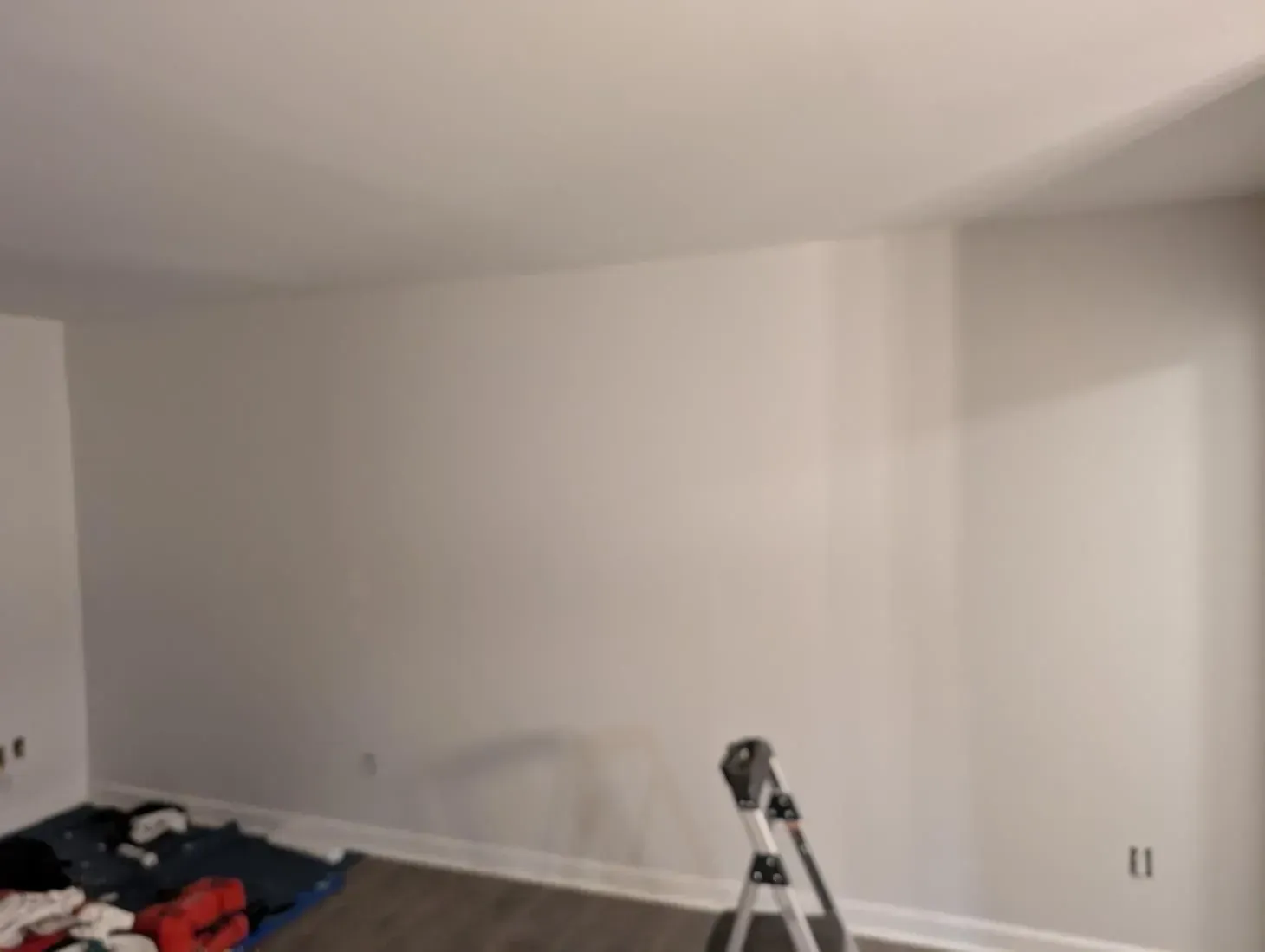 There is a tripod in the middle of the room.