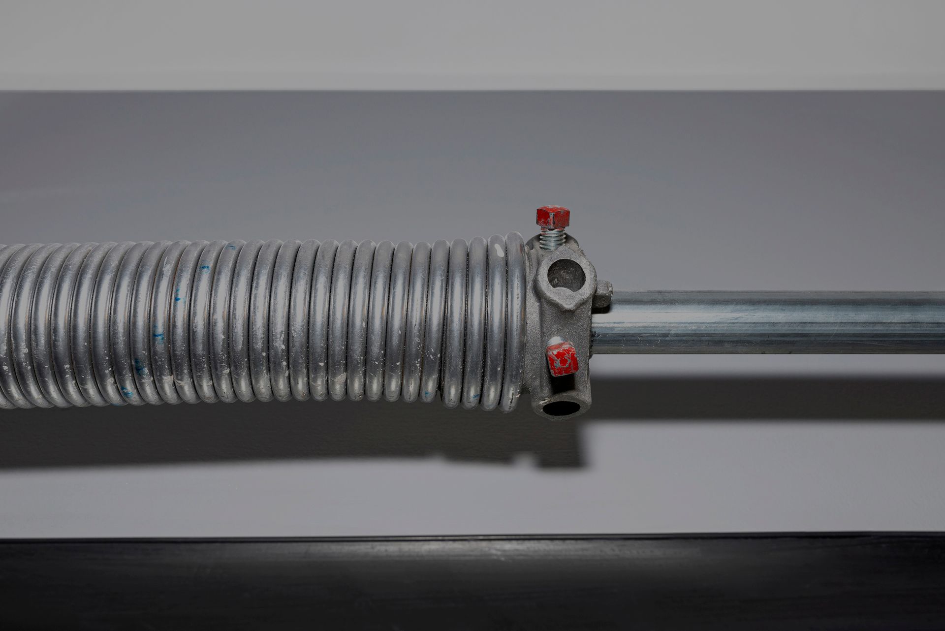 A garage door spring - Hagerstown, MD - J&B Garage Doors