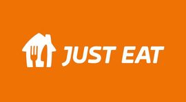 Il logo di Just Eat: un'icona bianca a forma di casa con la sagoma di una forchetta e di un coltello 