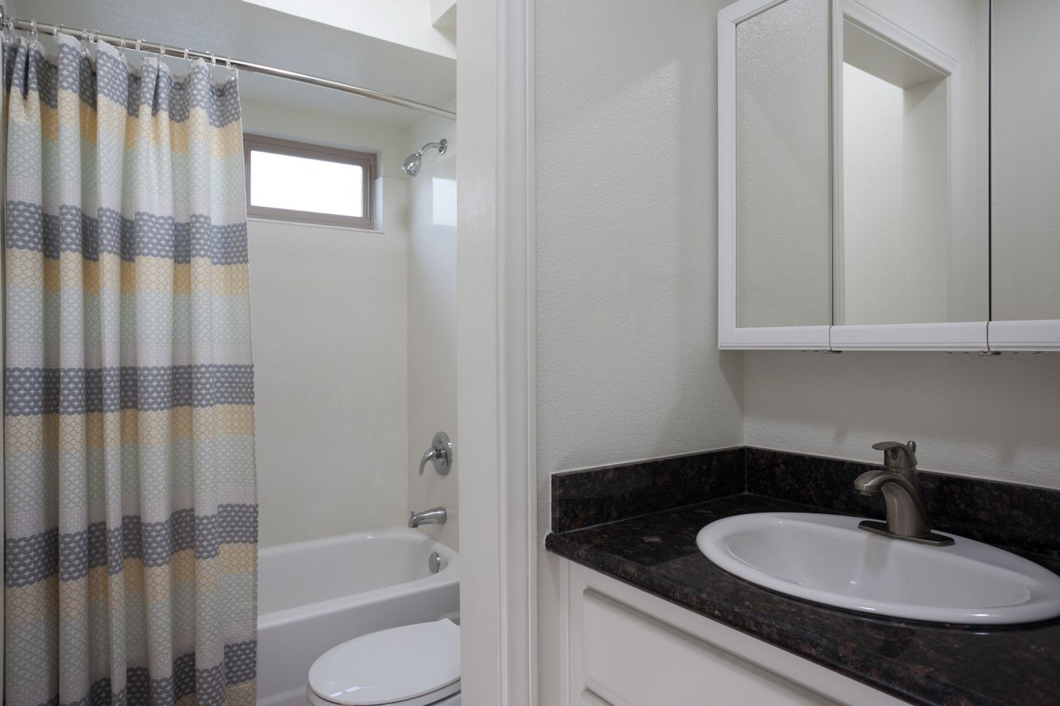 Modern studio with view of bathroom
