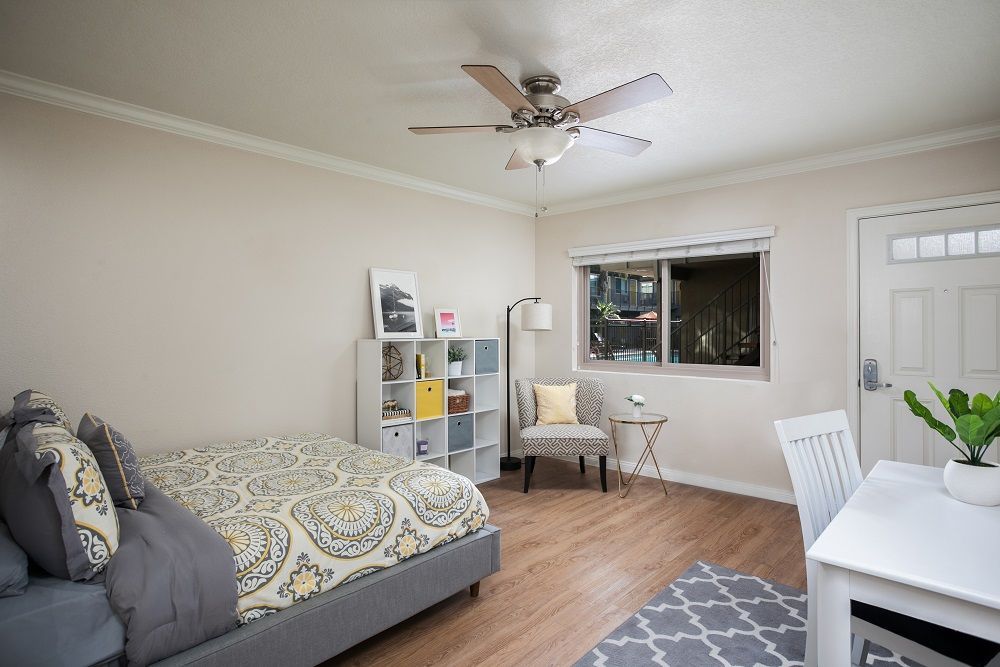 Modern studio with view of bed