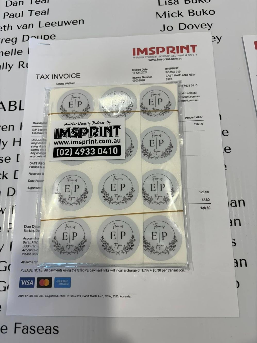 A Package of Imprint Stickers Sits on Top of A Tax Invoice — Imsprint in Lake Macquarie, NSW