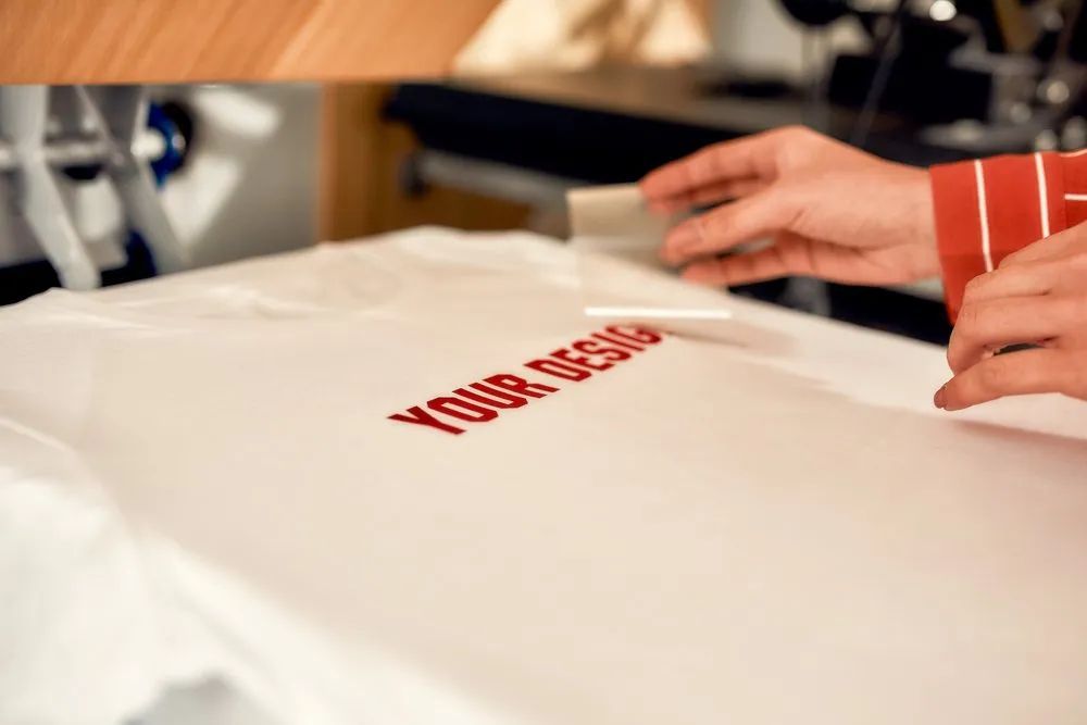 A Person Is Making a T-Shirt with The Word Your on It — Imsprint in Mayfield West, NSW