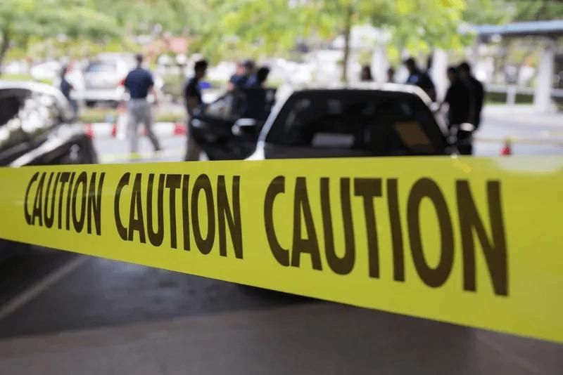 A Yellow Caution Tape Is Covering a Parking Lot — Imsprint in East Maitland, NSW