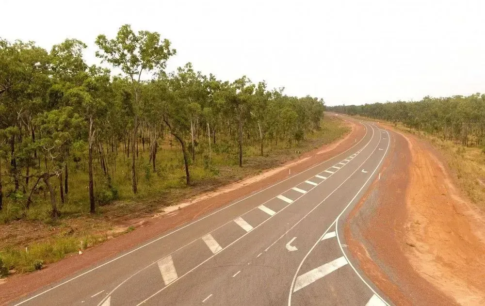 Paved Road Through Forest, Part of Gunn Point Road Package 3 Upgrade — Ostojic Group in Berrimah, NT