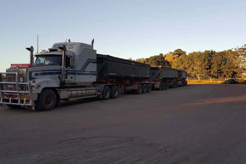A Large Semi Truck is Parked in a Parking Lot — Ostojic Group in Berrimah, NT