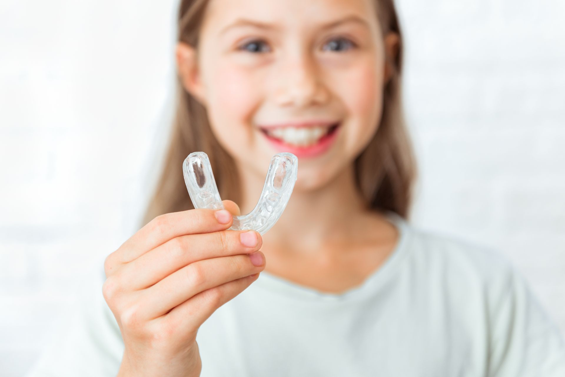 Raddrizzare i denti con mascherine trasparenti nello Studio Dentistico Buican a Porto San Giorgio.