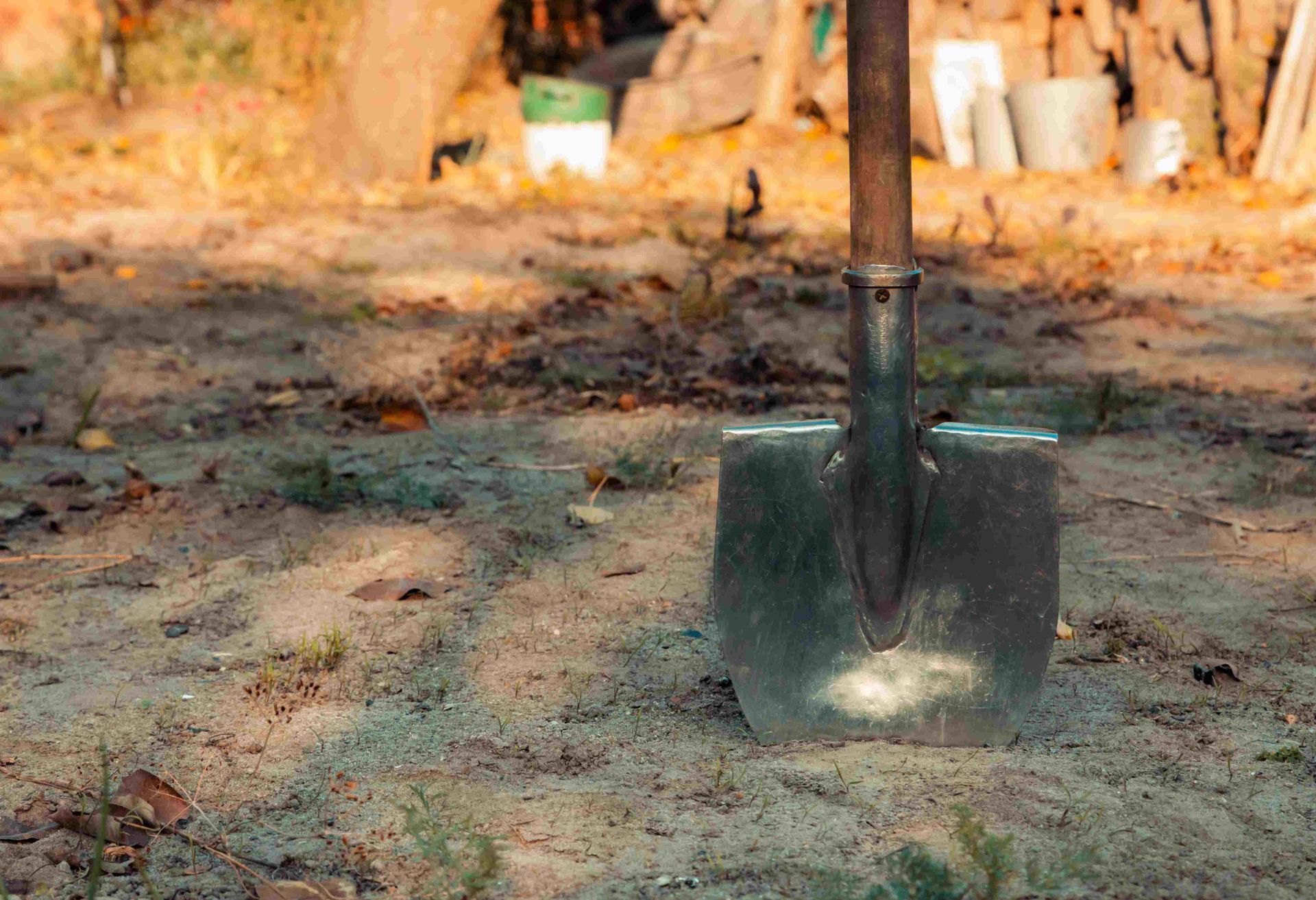 A shovel sticking into the gound