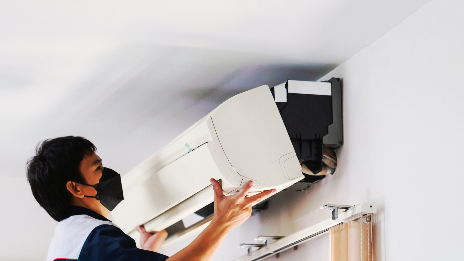 Local HVAC heating and cooling expert installing air conditioning system for residential indoor comfort