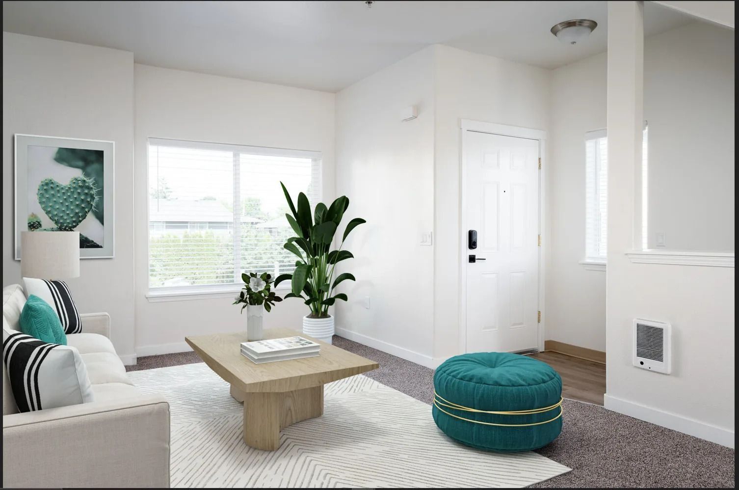 Bright white living room with teal accents, plants, and a wooden coffee table on a light rug.