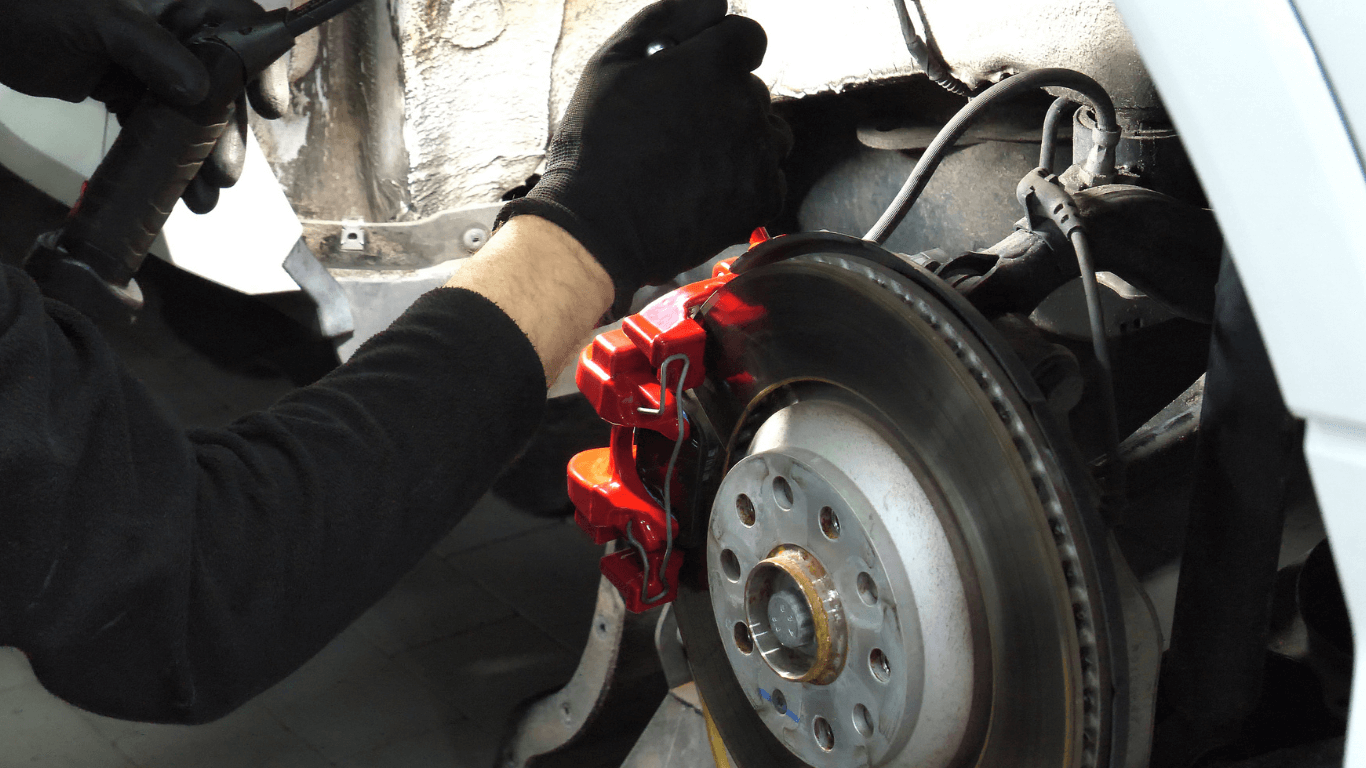 a mechanic doing brake service