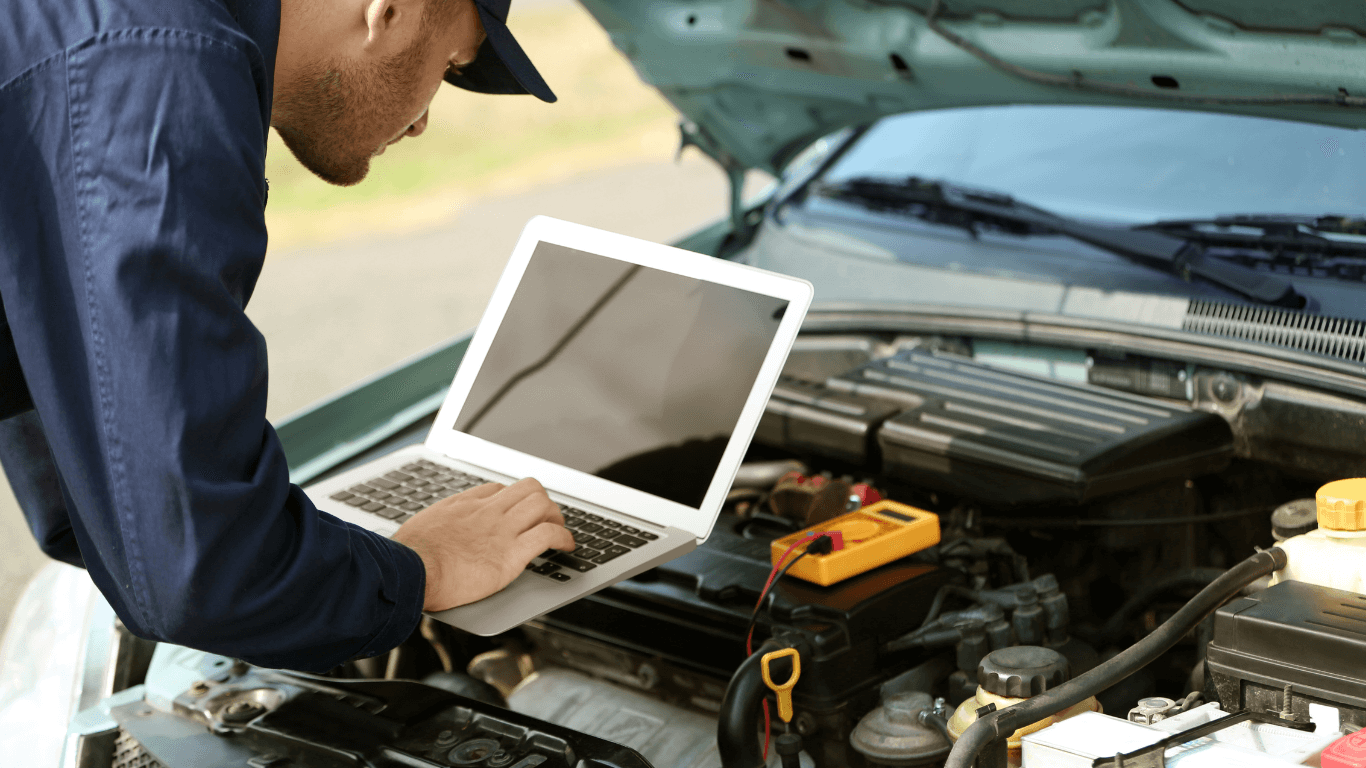 a mechanic doing a vehicle diagnostic