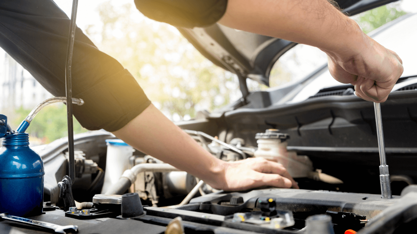 a mechanic doing an on-site auto repair