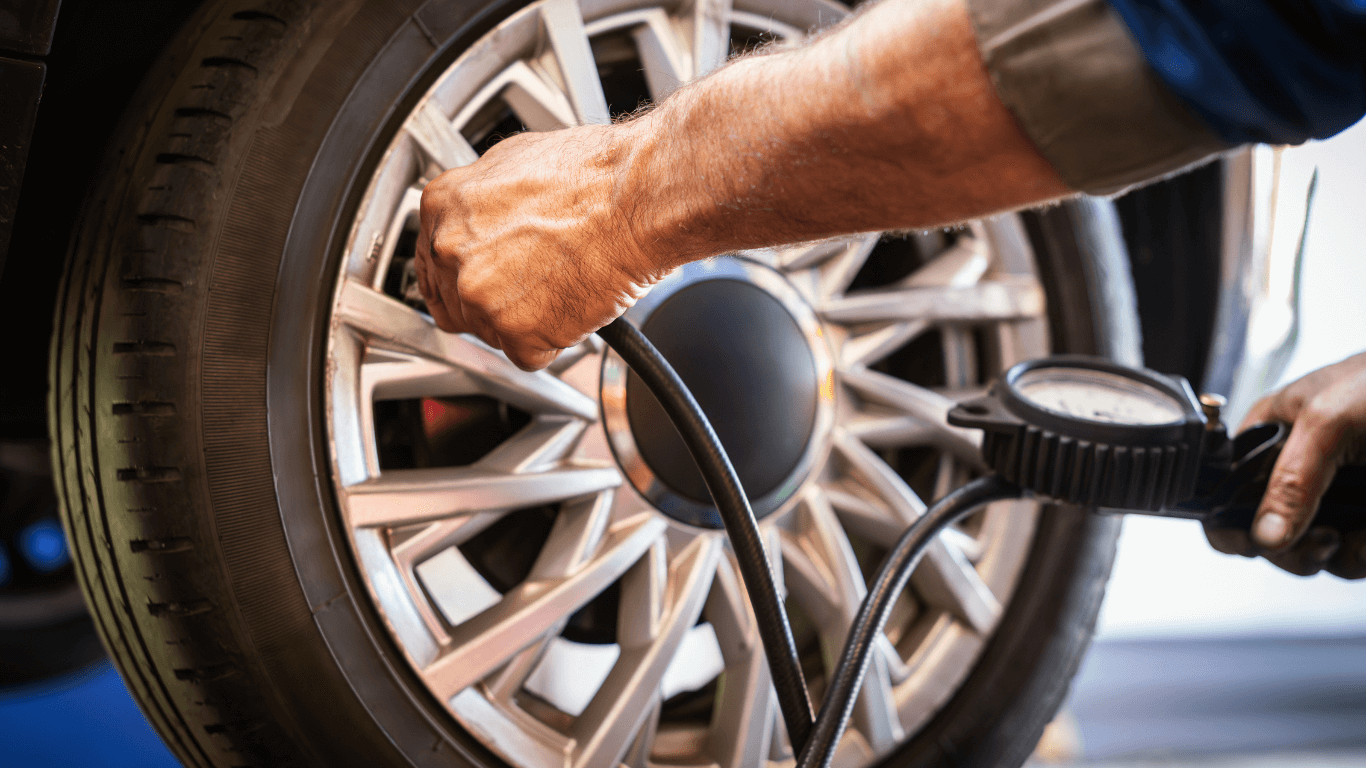 a mechanic inspecting a car