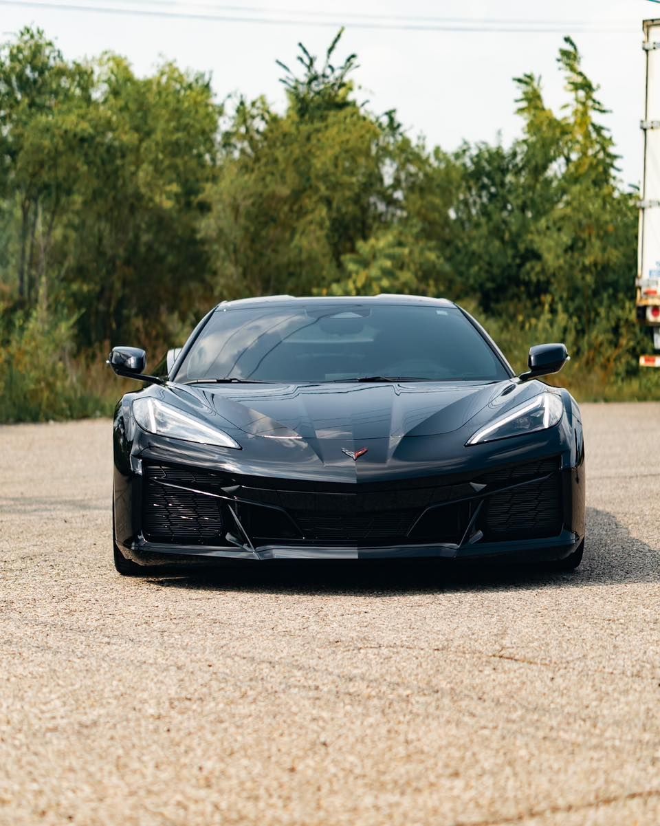 Ceramic coating on a black sports car.