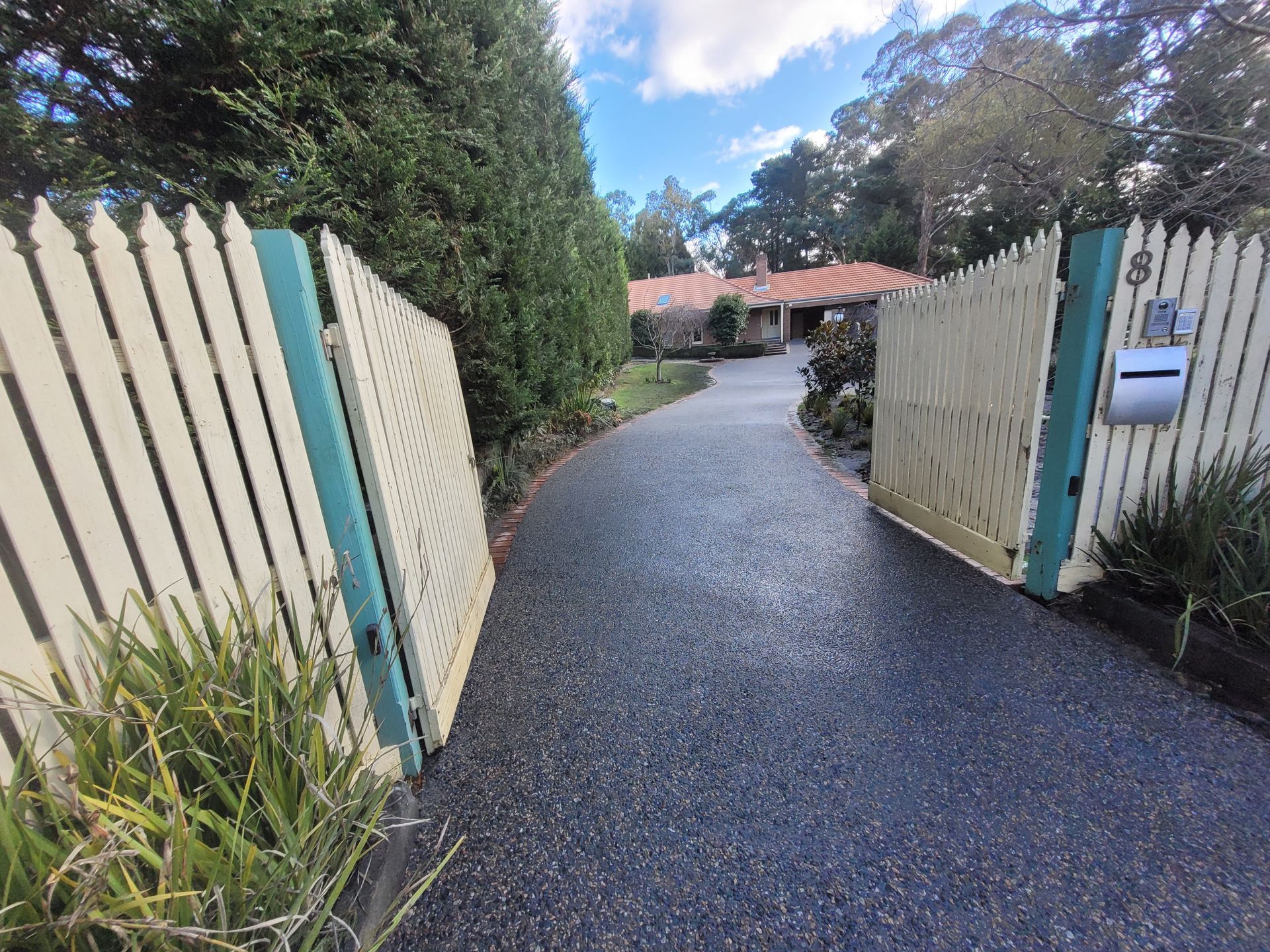Shiny Concrete Driveway - Melbourne, VIC - Salcon Paving