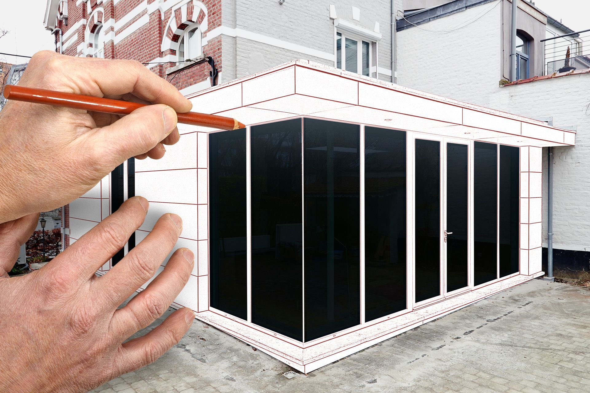 A proof-of-concept image of two hands with a pencil painting an extension over a house.