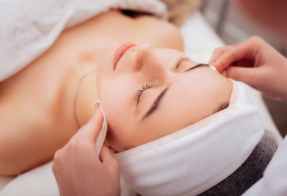A Woman Getting A Facial Treatment — Troy, NY — Brunswick Esthetics A Woman Getting A Facial Treatment — Troy, NY — Brunswick Esthetics