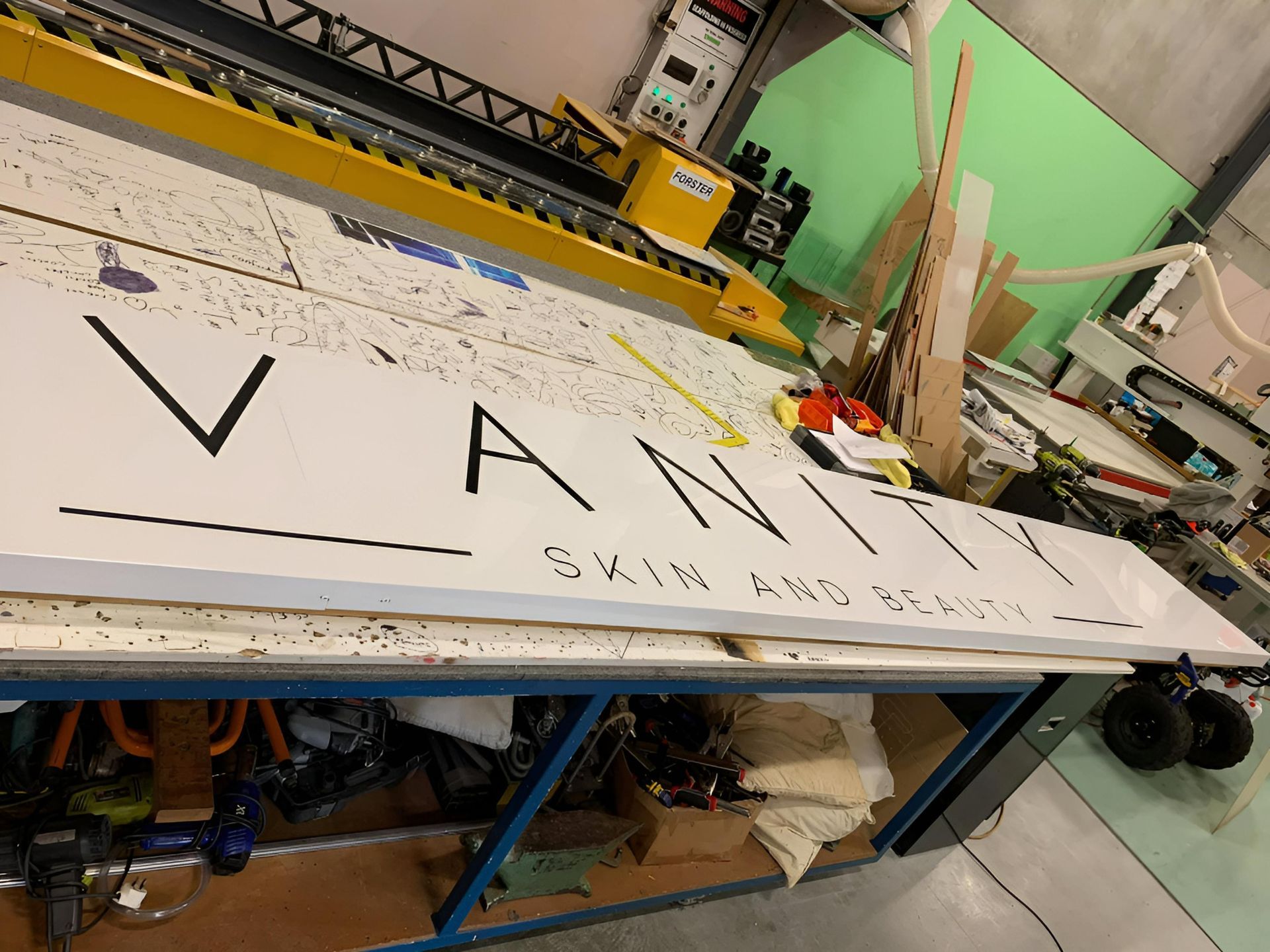 A large white sign that says vanity skin and beauty