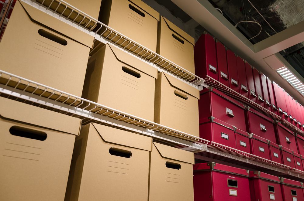 A Bunch Of Cardboard Boxes Are Stacked On Top Of Each Other — Howlett's Mini Storage In Bundaberg East, QLD