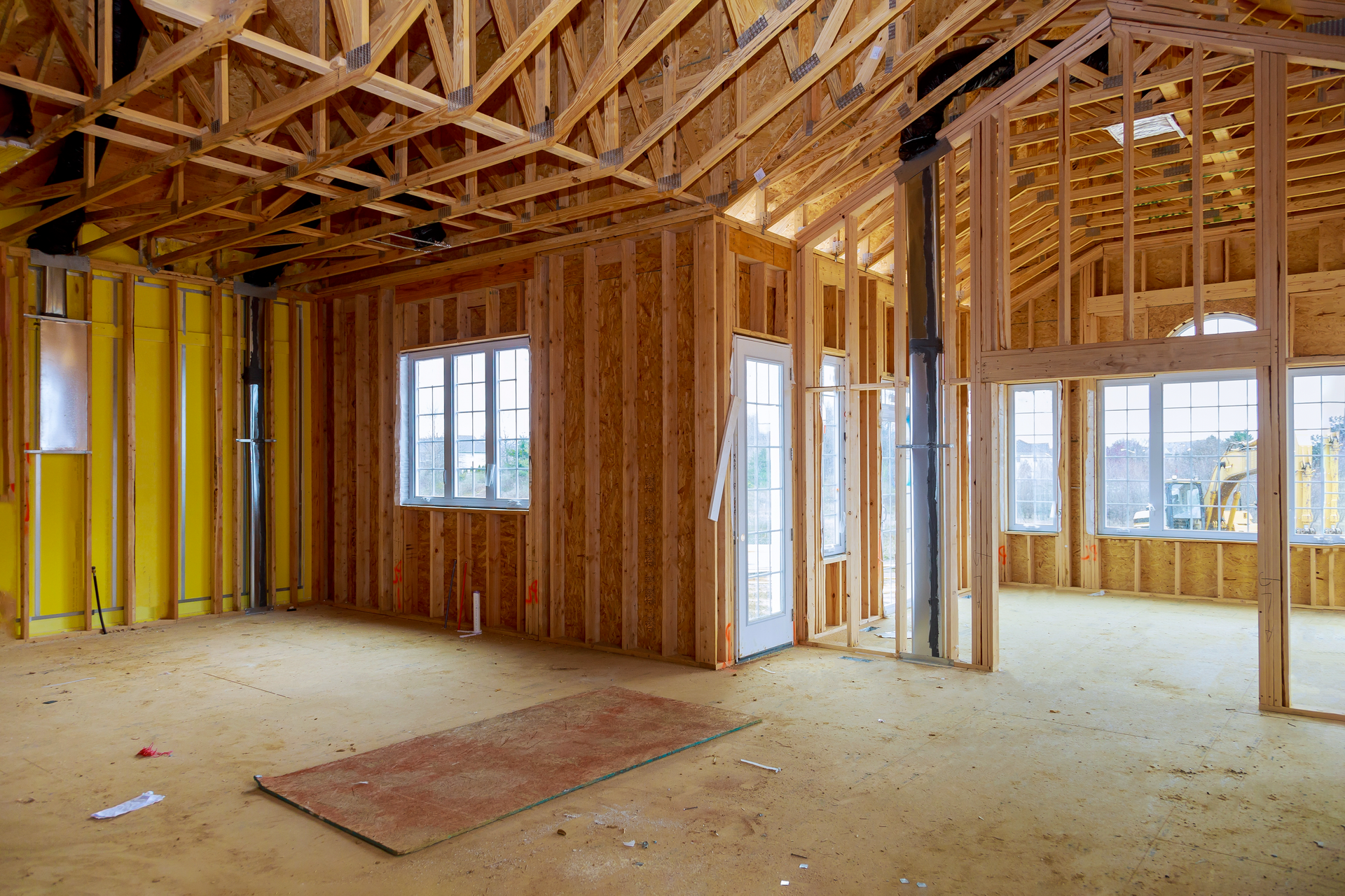 Construction team from Red Beaver Construction working on a room addition project.