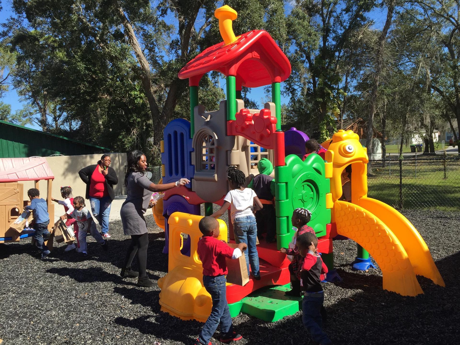 A group of children are playing on a playground.