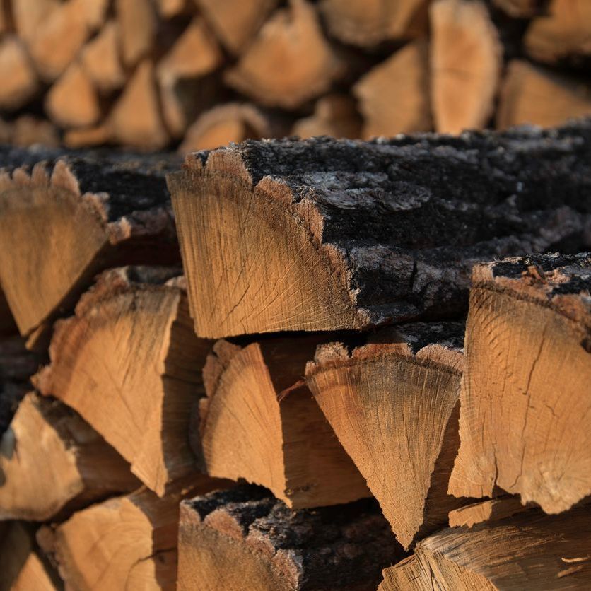 A pile of logs stacked on top of each other