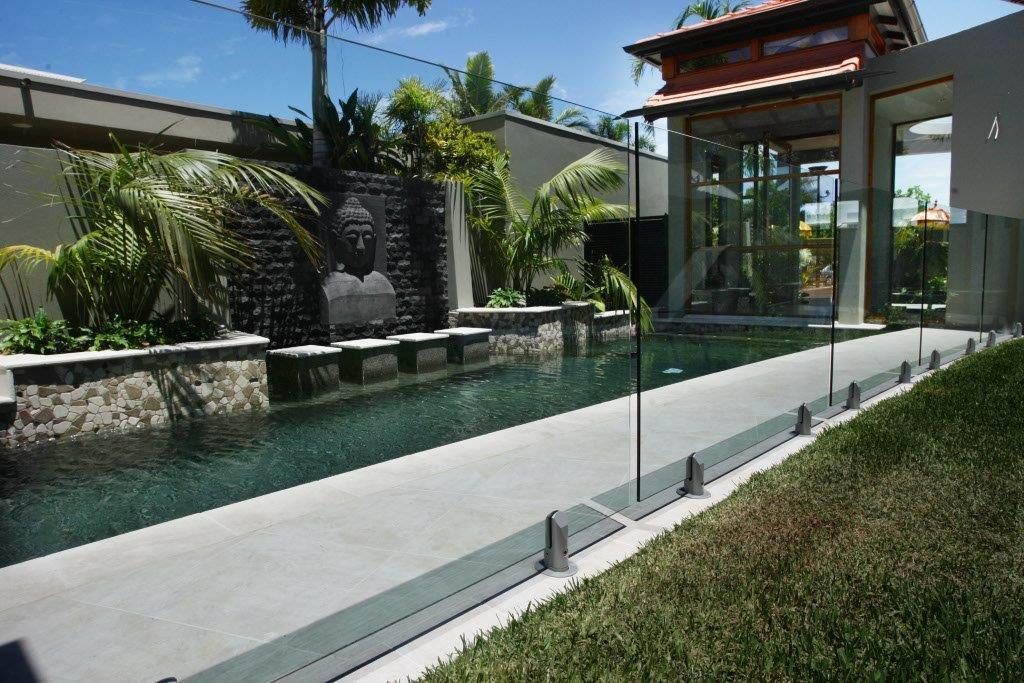 A Bathroom With a Walk in Shower With a Glass Door — Frameless Shower Installations In Maroochydore, QLD
