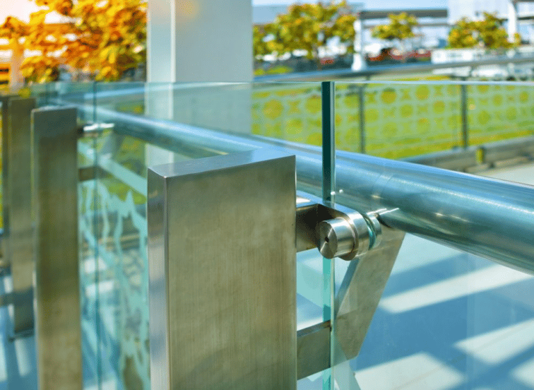 A Stainless Steel Railing With Glass  — Frameless Shower Installations In Maroochydore, QLD