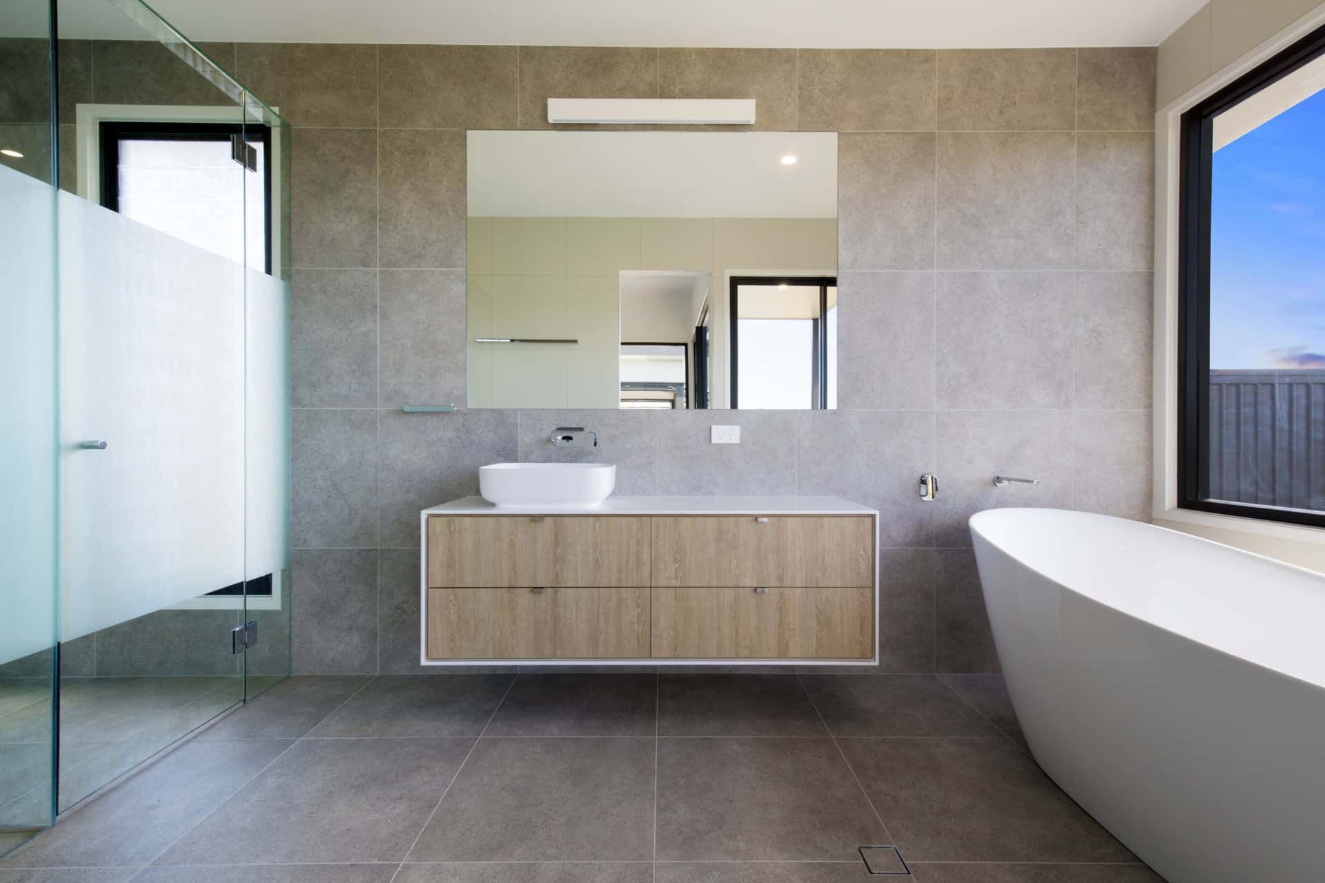 Modern Bathroom with Gray Tiled Walls and Floors — Frameless Shower Installations, Sunshine Coast