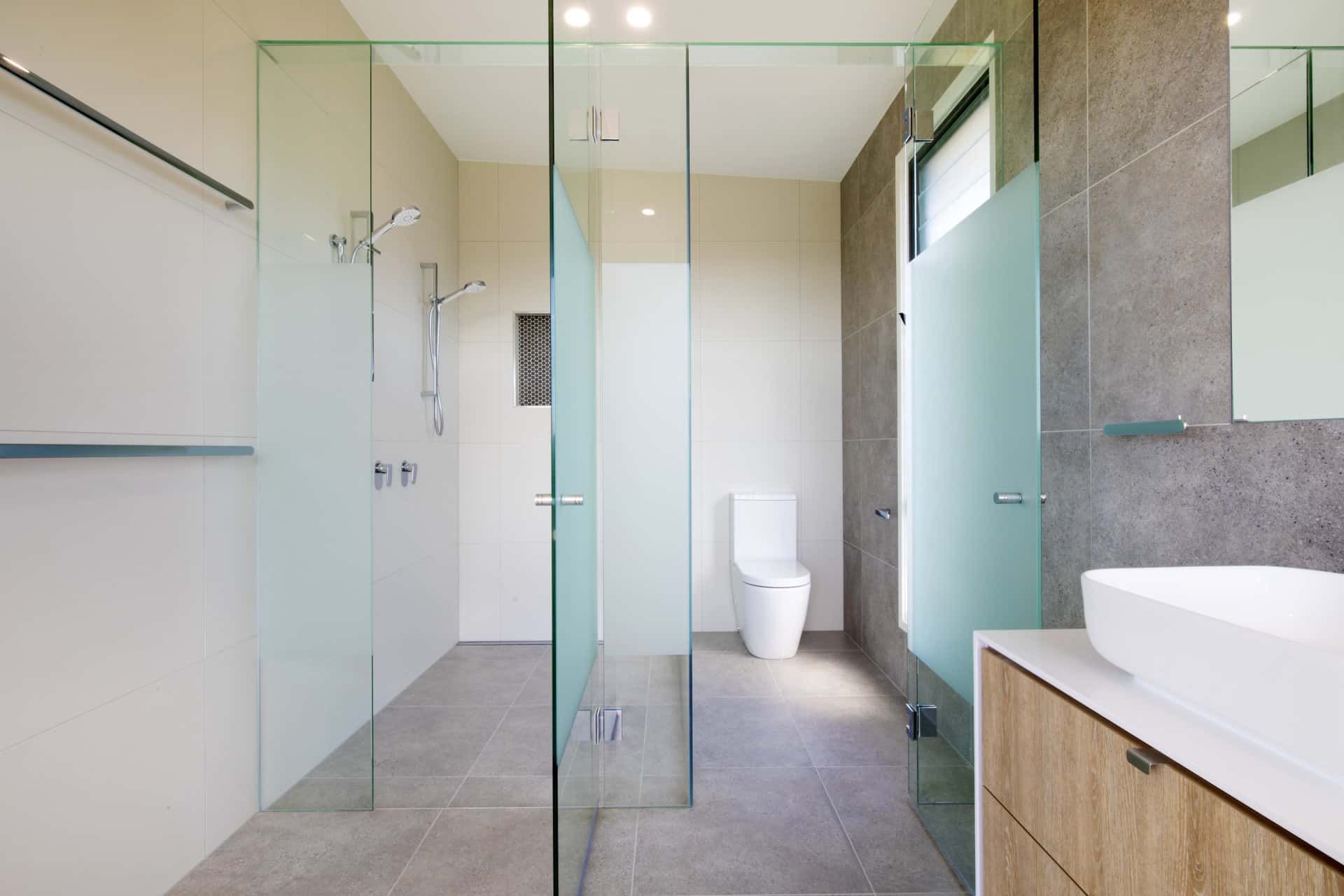 A Modern Bathroom with Glass Shower and Toilet Enclosures — Frameless Shower Installations, Sunshine Coast