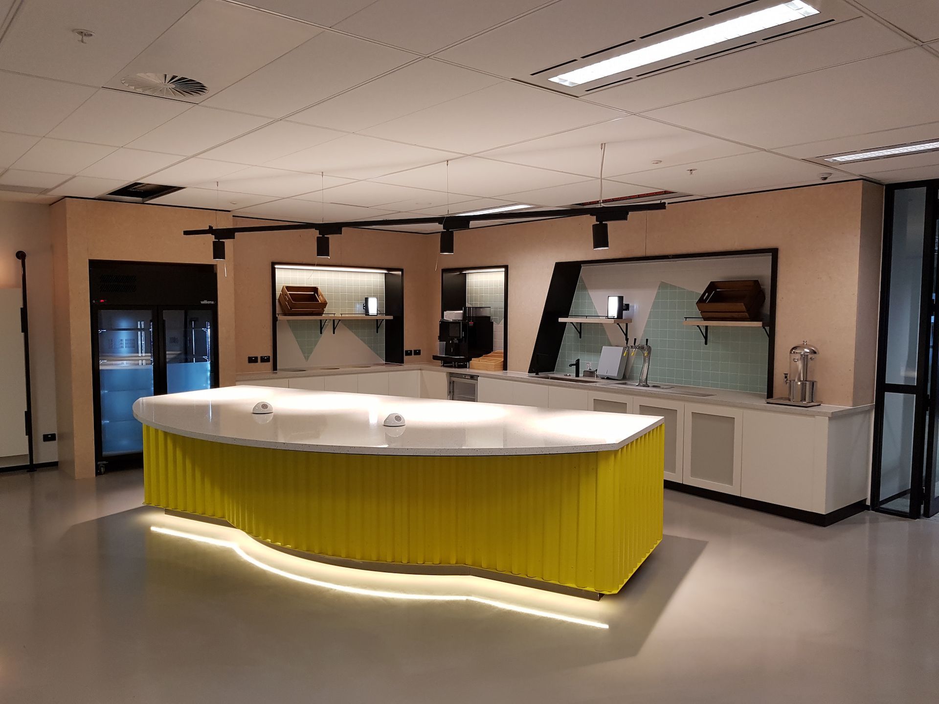 There Is a Large Yellow Table in The Middle of The Room — Sheridan Stone Aust in Yamba, NSW