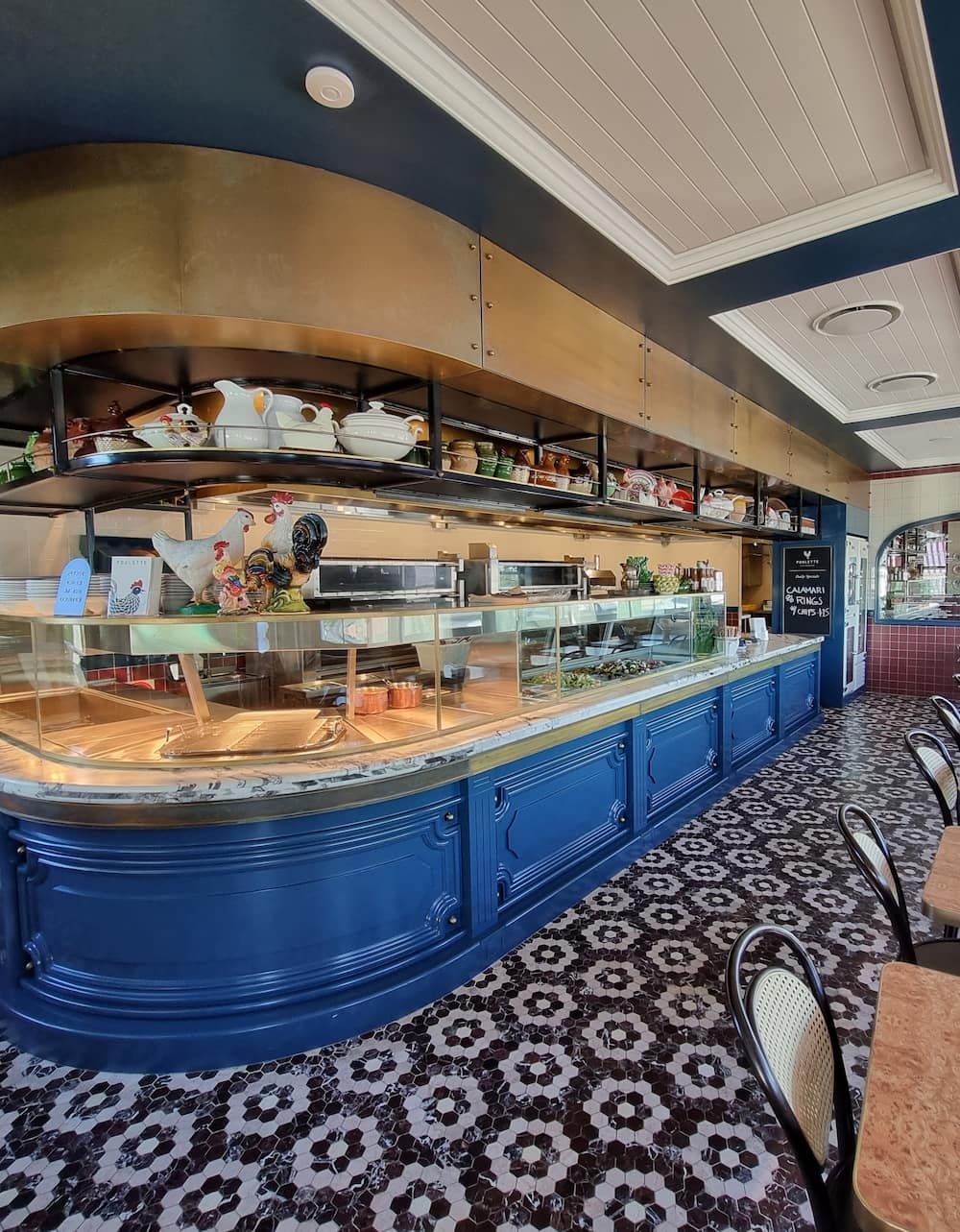 A Long Buffet Line in A Restaurant with Tables and Chairs — Sheridan Stone Aust in Toormina, NSW