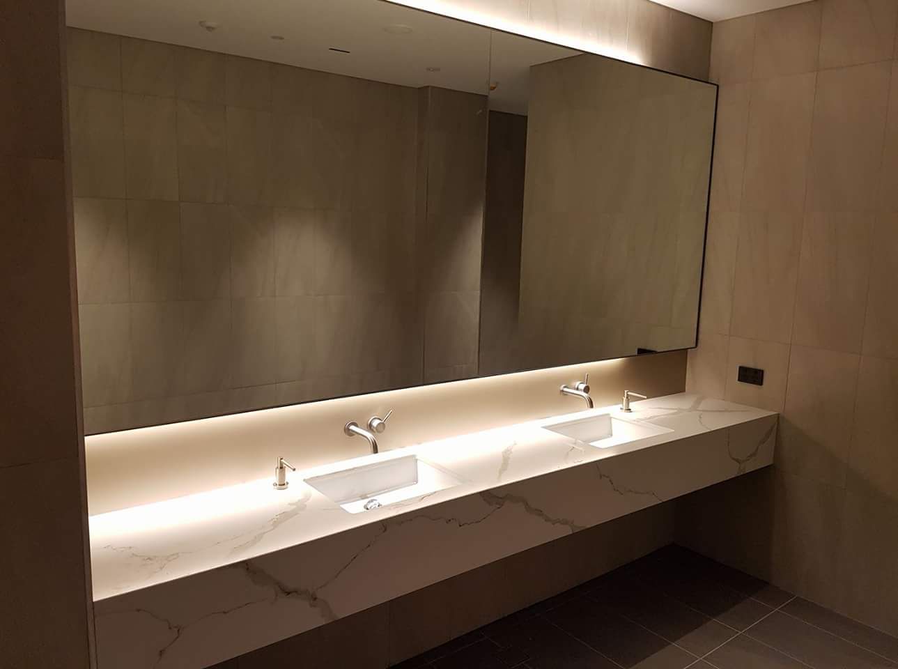 A Bathroom with Two Sinks and A Large Mirror — Sheridan Stone Aust in Toormina, NSW
