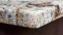 A Close up Of a Granite Counter Top with A Corner — Sheridan Stone Aust in Toormina, NSW
