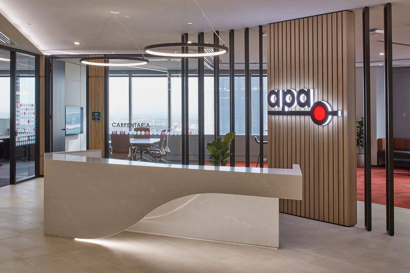 A Reception Desk in An Office with A Sign that Says apa on It — Sheridan Stone Aust in Toormina, NSW