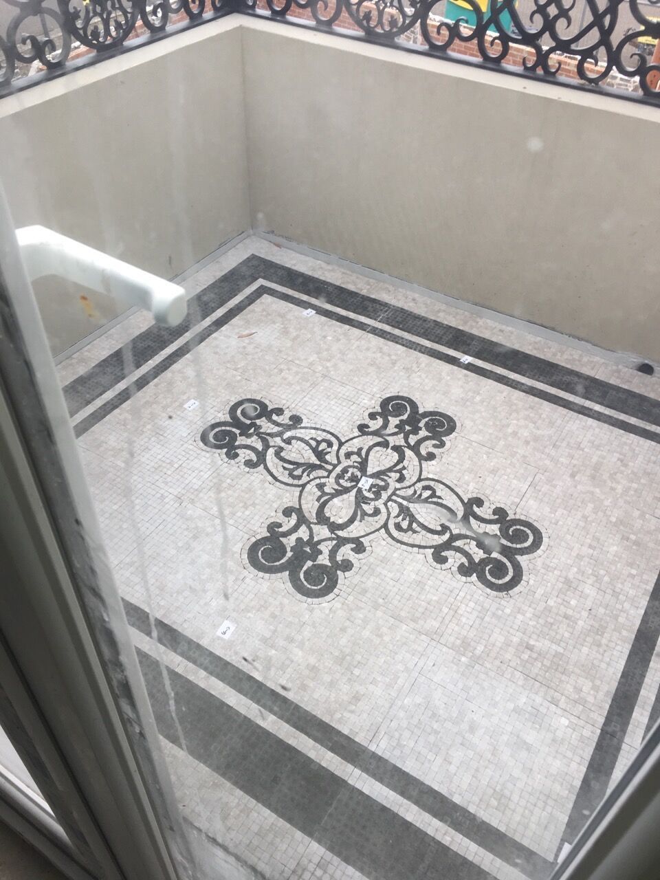 A Marble Floor with A Cross Design on It — Sheridan Stone Aust in Ballina, NSW