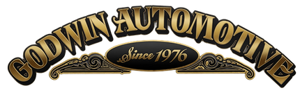 Goodwin Automotive logo with gold text and “Since 1976” on a black background