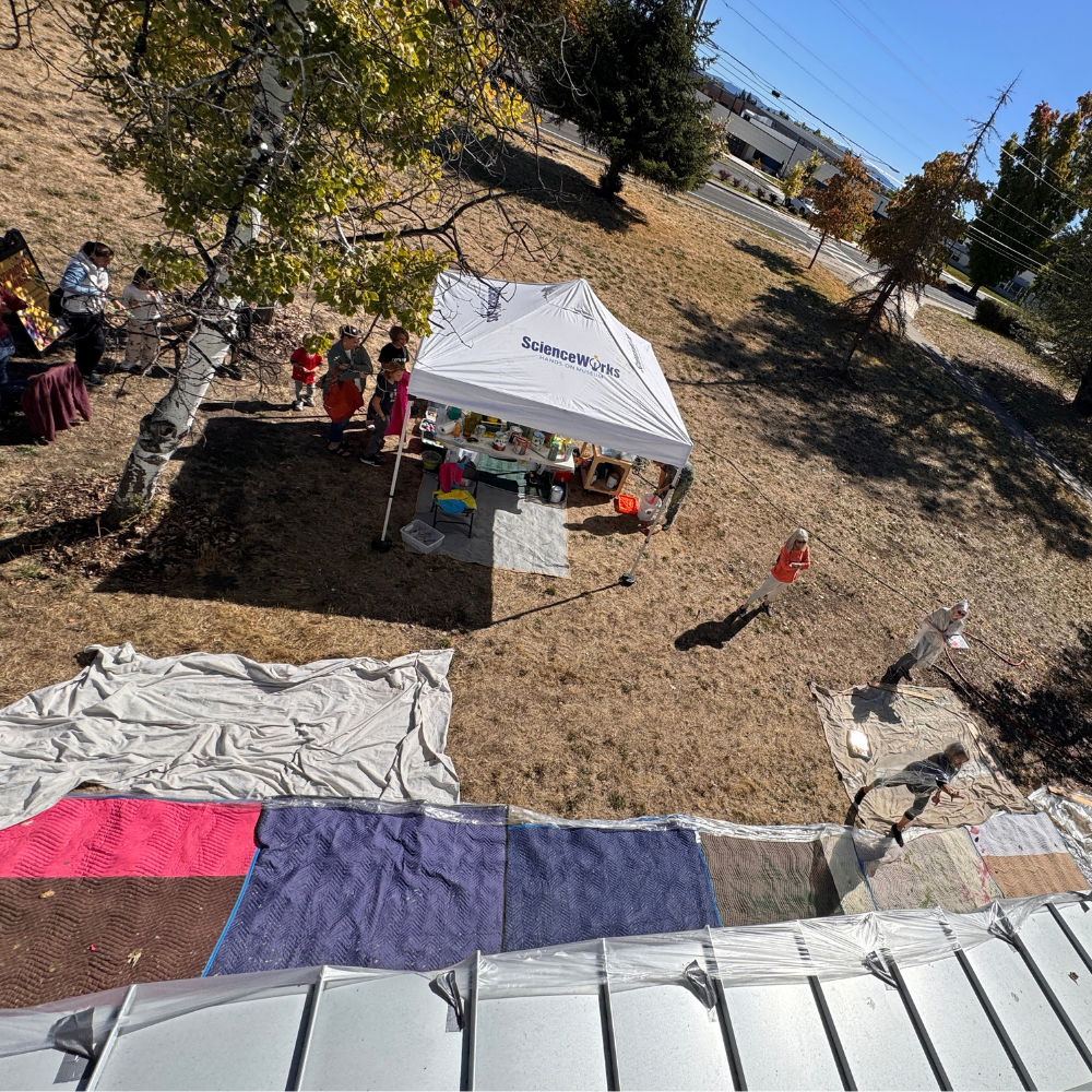 aerial view of people participating in the community mural project