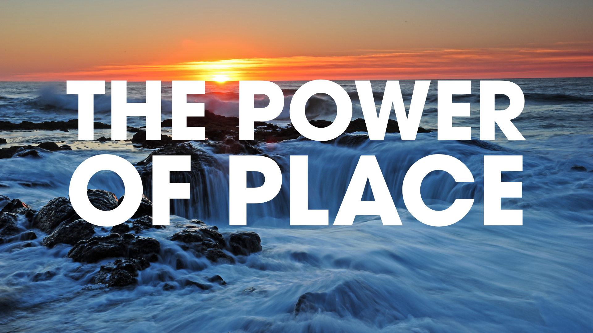 A sunset over a rocky coastline with ocean waves, overlaid with the white text