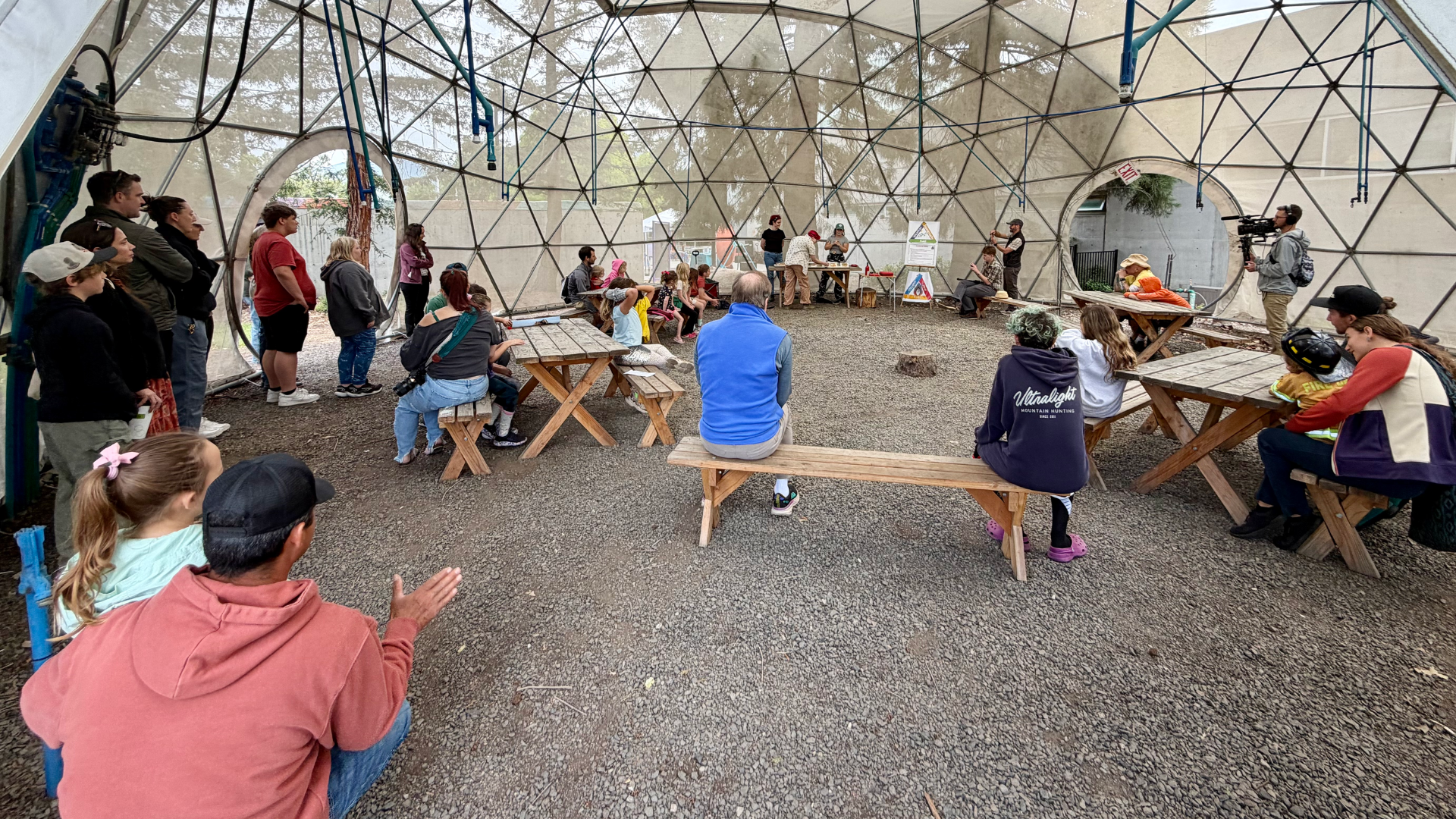 SOFRC educators perform a fire science demonstration in the ScienceWorks Dome.