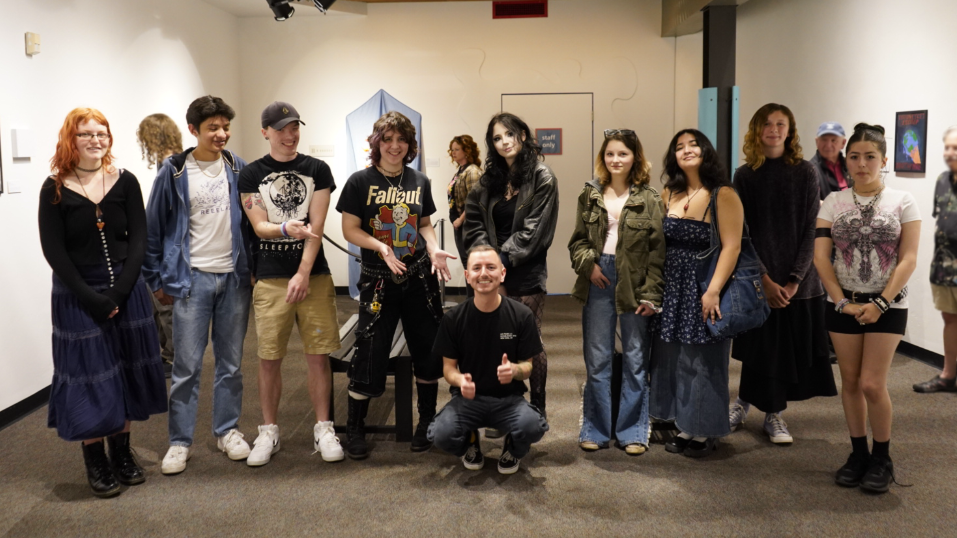 The teen artists who created the art pieces in the exhibit
