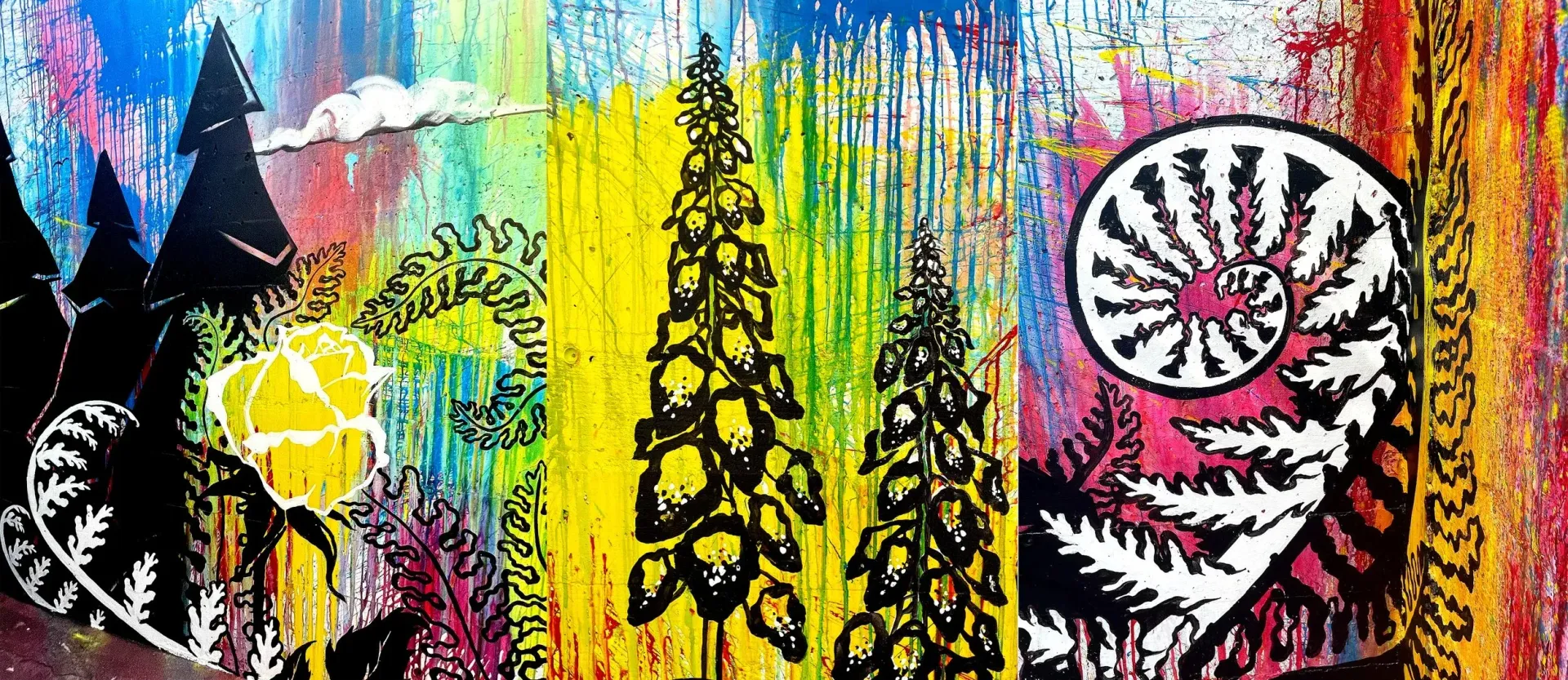 Colorful abstract mural with bold organic shapes, and a black and white fern motif on the right