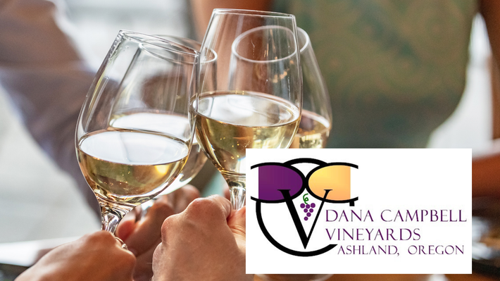 Two wine glasses clink in front of Dana Campbell Vineyards logo