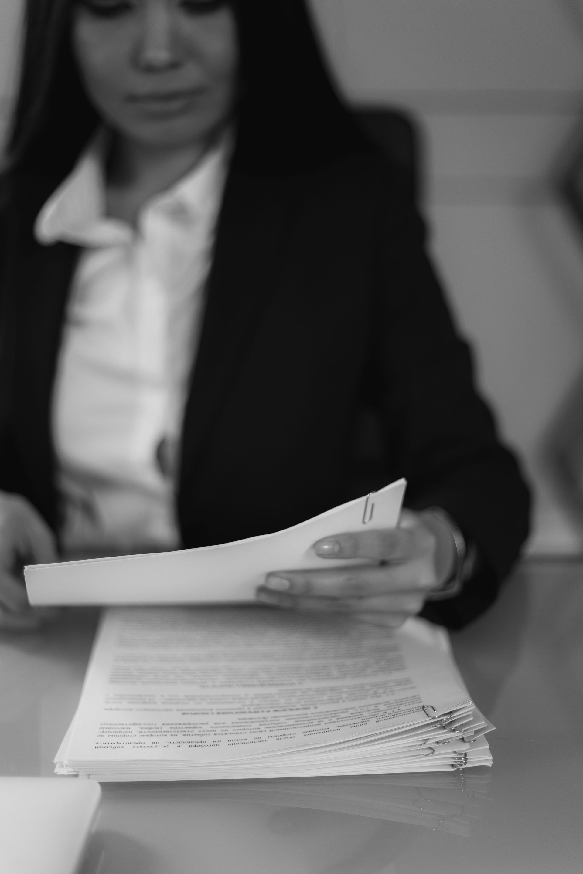 Client reviewing court papers to determine whether a bad legal outcome may involve legal malpractice
