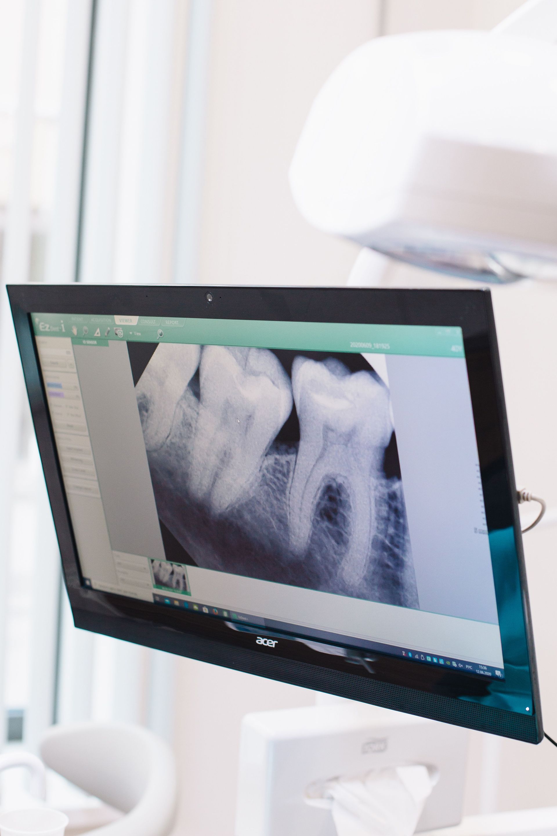 Dental office computer showing cybersecurity and HIPAA privacy protections for patient information