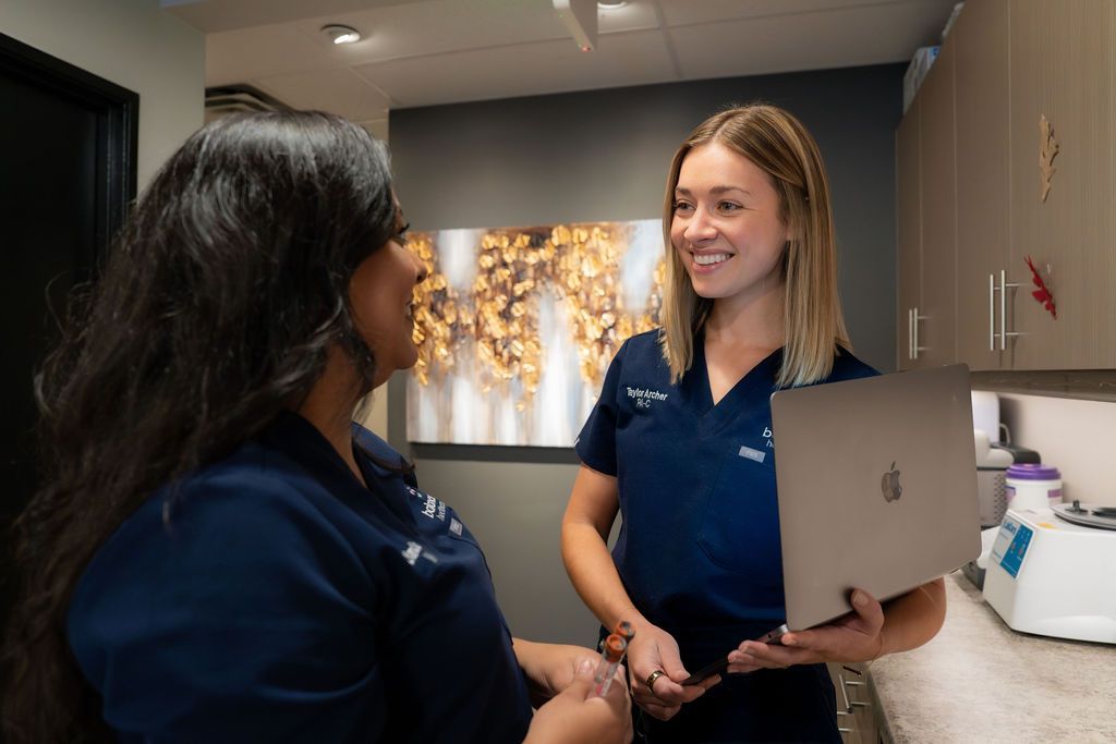 Balanced Healthcare staff talking two each other