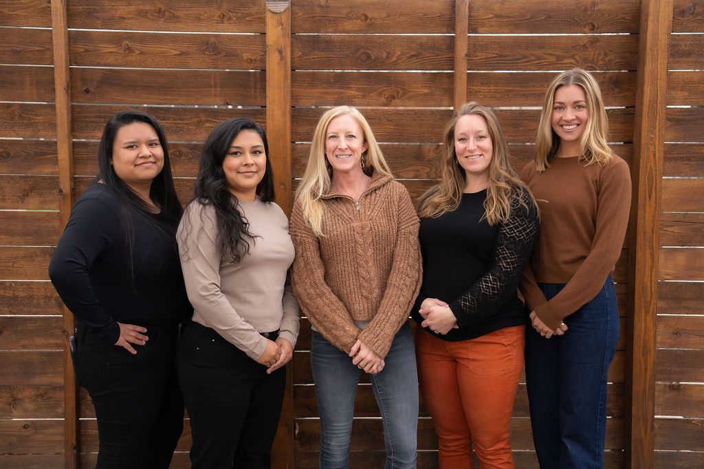 Cora Mattie with team members at Balanced Healthcare